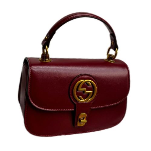 Burgundy designer crossbody bag Elegant women’s handbags with gold hardware
